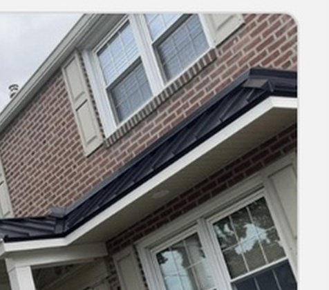Black Seamless Aluminum Gutters & Window Fascia