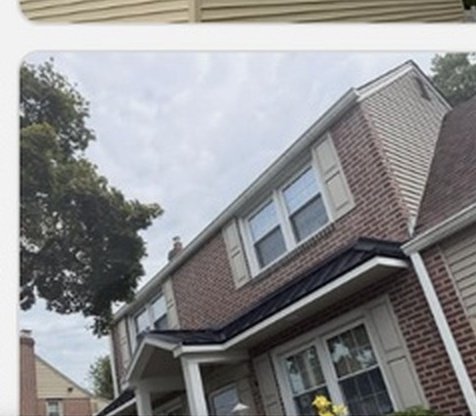 Two-Story Brick Dormer & Downspout System
